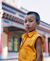 monk in front of temple